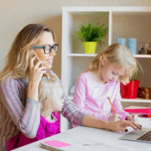 woman working from home with child