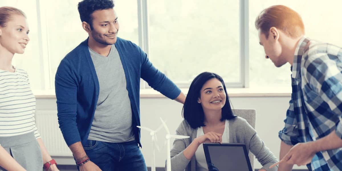 Coworkers smiling and working together