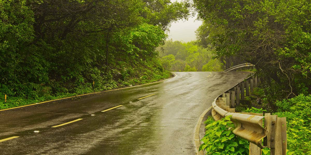 Winding road during rain shower (1)