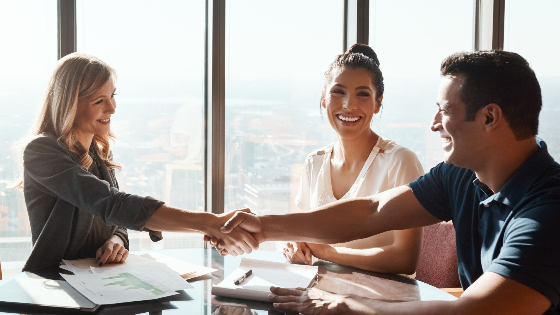 Woman pointing at project on desk